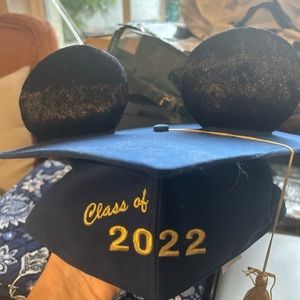 Disney grad cap never used only on display. Trying to pay emergency vet bill